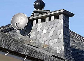 Как заделать дымоход
 на крыше: способы герметизации